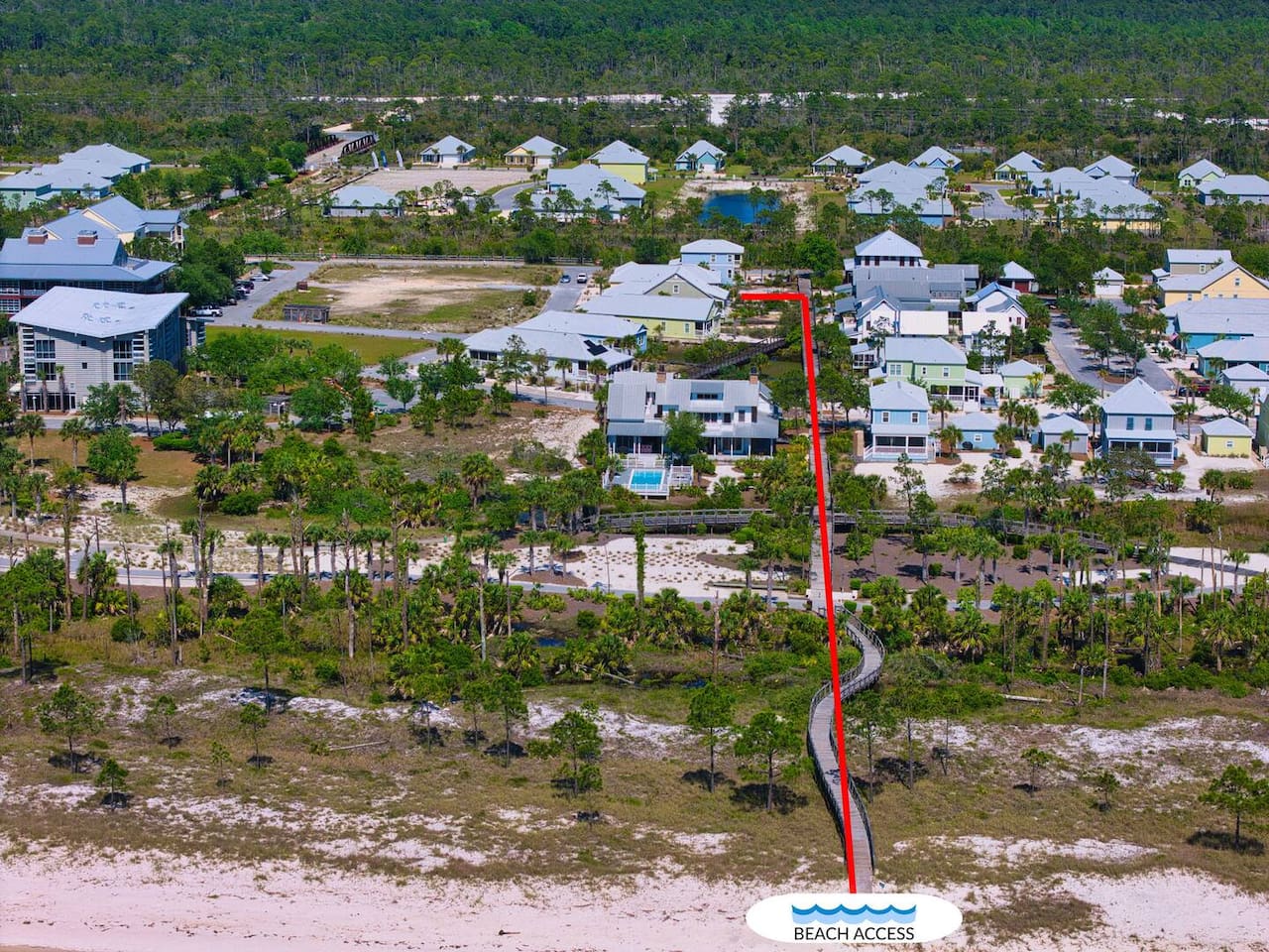 Follow the dedicated boardwalk for a quick and scenic walk to the beautiful white-sand beach