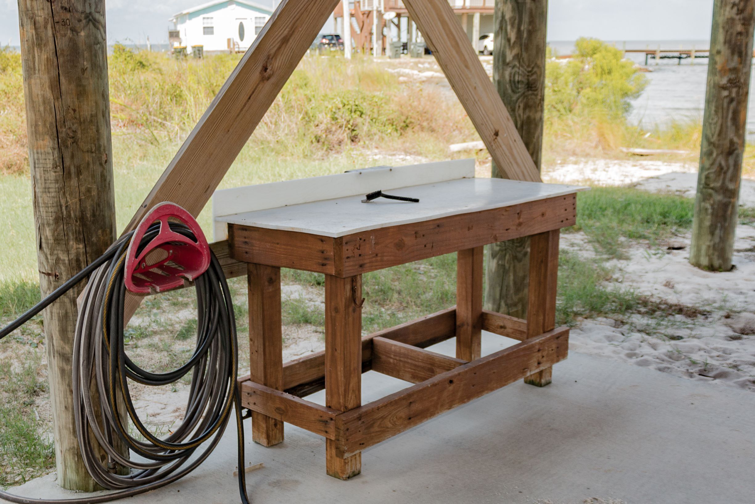 Fish cleaning station located under the house