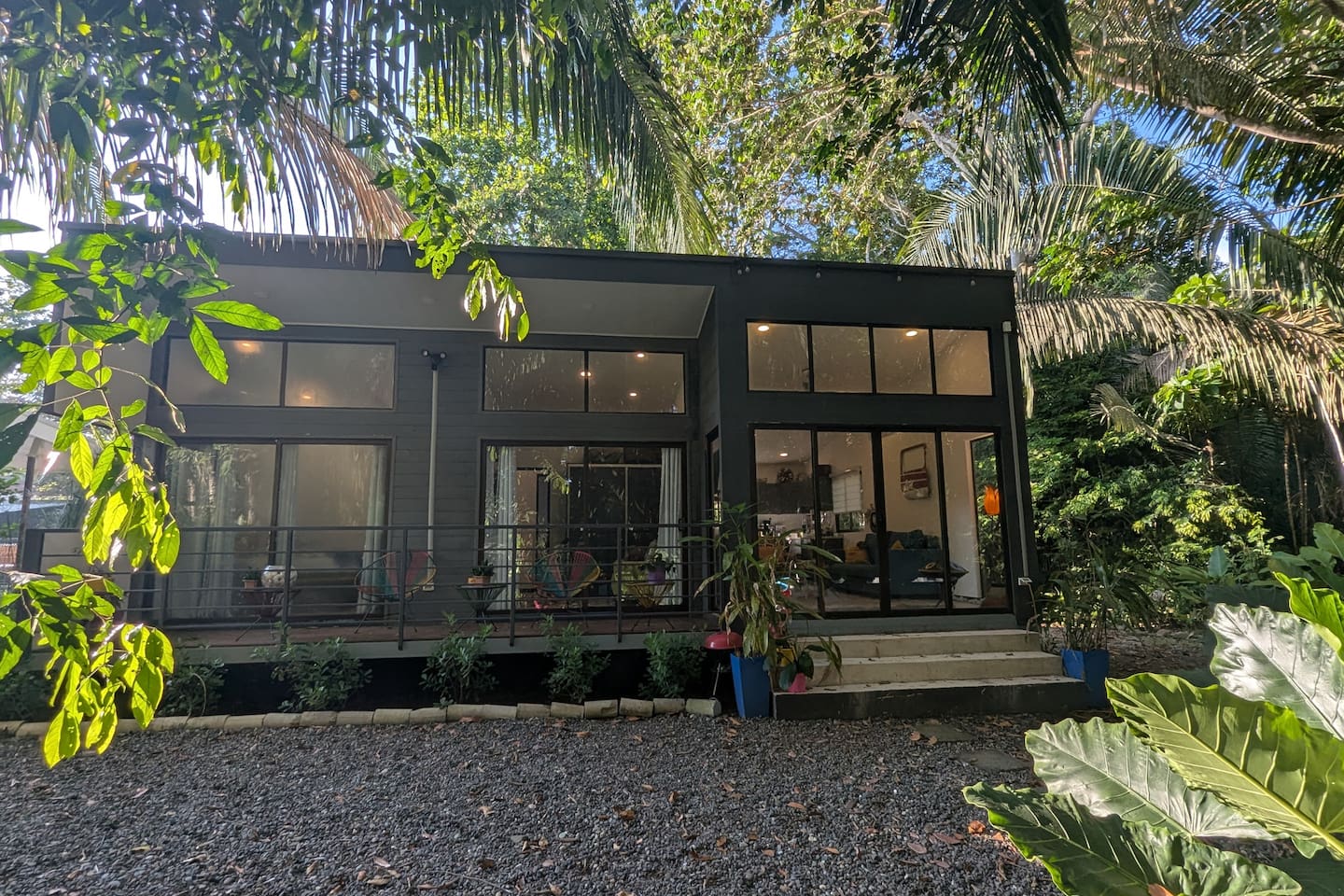 View from the backyard. All rooms have floor to ceiling windows