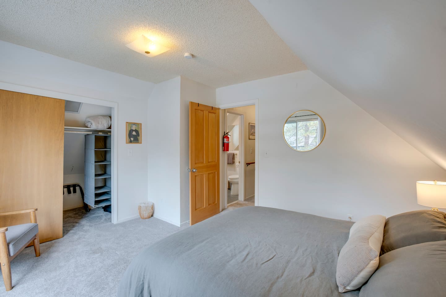Upstairs bedroom with an attached balcony