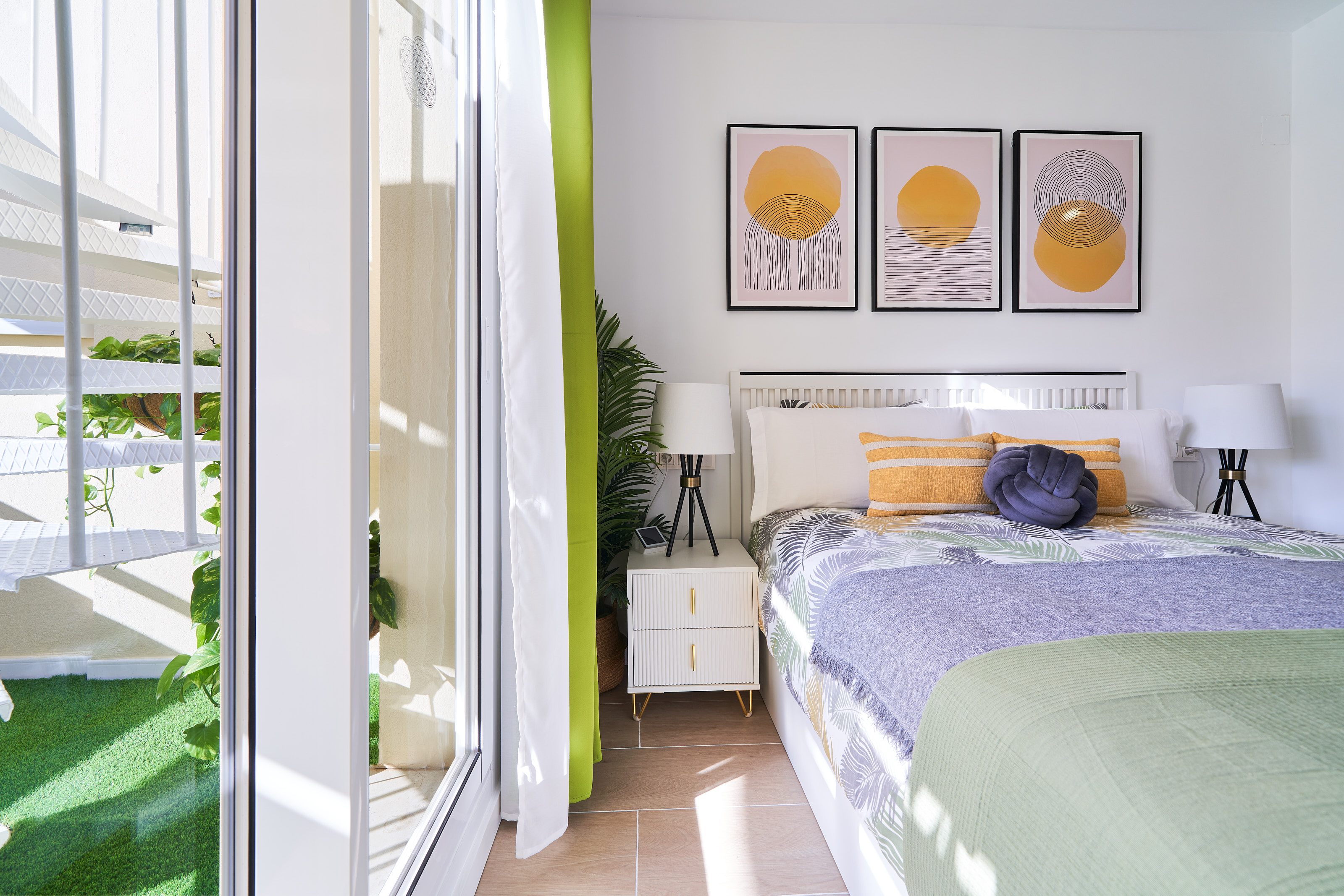 Bright and elegant master bedroom with a private terrace, walk-in wardrobe, and a serene atmosphere designed for restful nights.