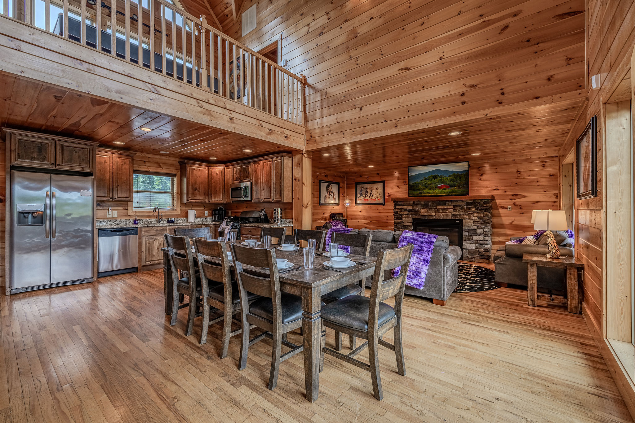 This dining space keeps everyone connected to the kitchen, living room, and main-level gathering areas.