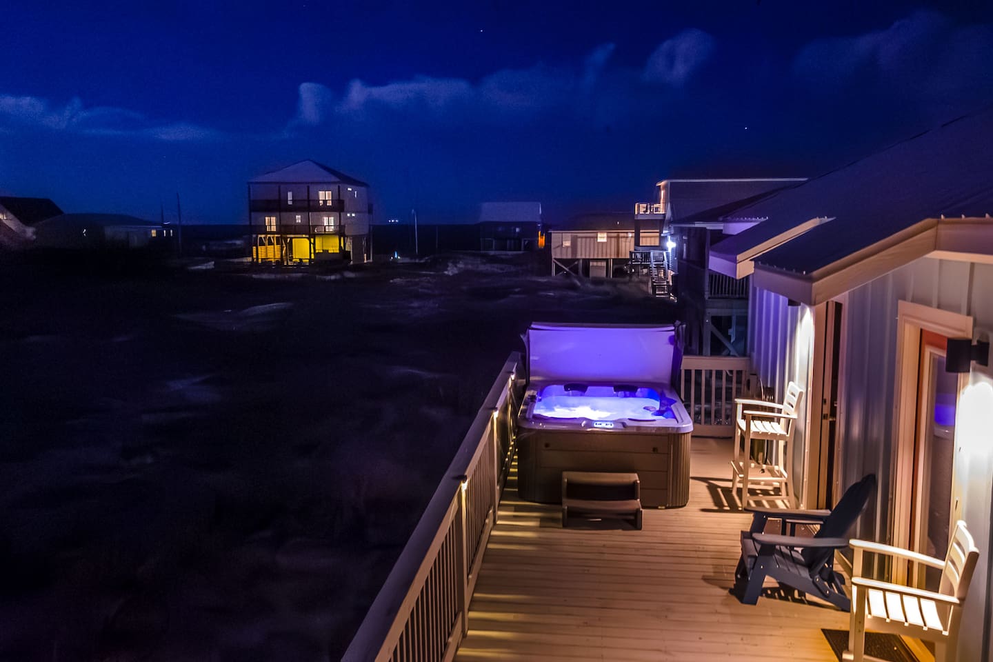 Enjoy the evening in the hot tub on the back porch