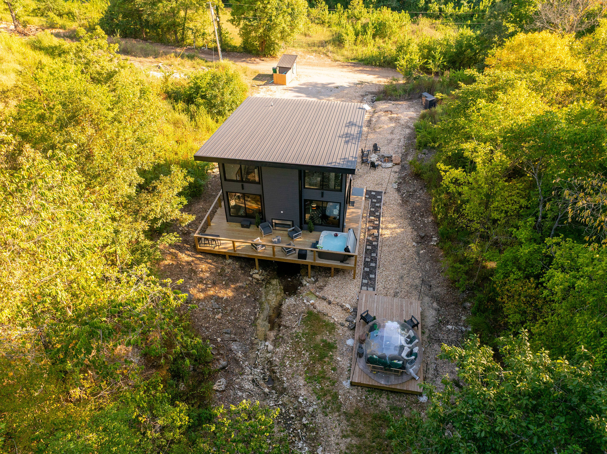 Tucked into two wooded acres near Table Rock Lake, Echo Creek feels wonderfully removed from the everyday.