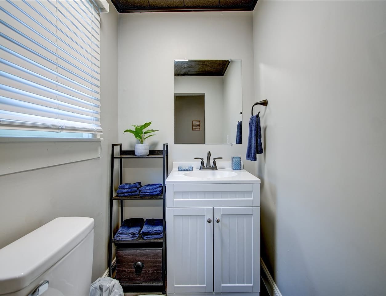 half bath attached to twin bedroom