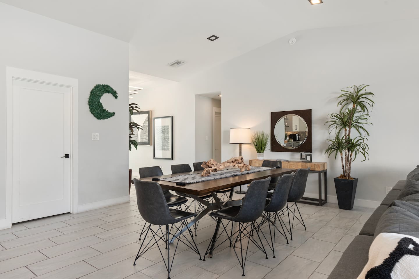 Modern dining table with sleek seating.

