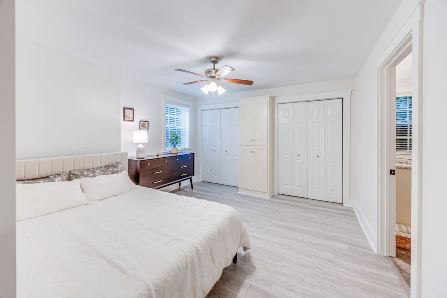 Spacious bedroom featuring ample cabinets for storage, offering plenty of room to keep your belongings organized and the space clutter-free.