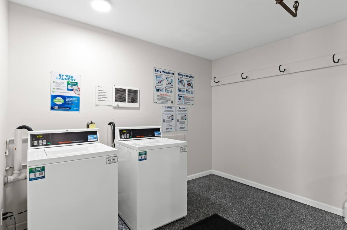 Simplify your routine with clearly labeled, coin-operated washers and hooks for easy laundry-day organization.