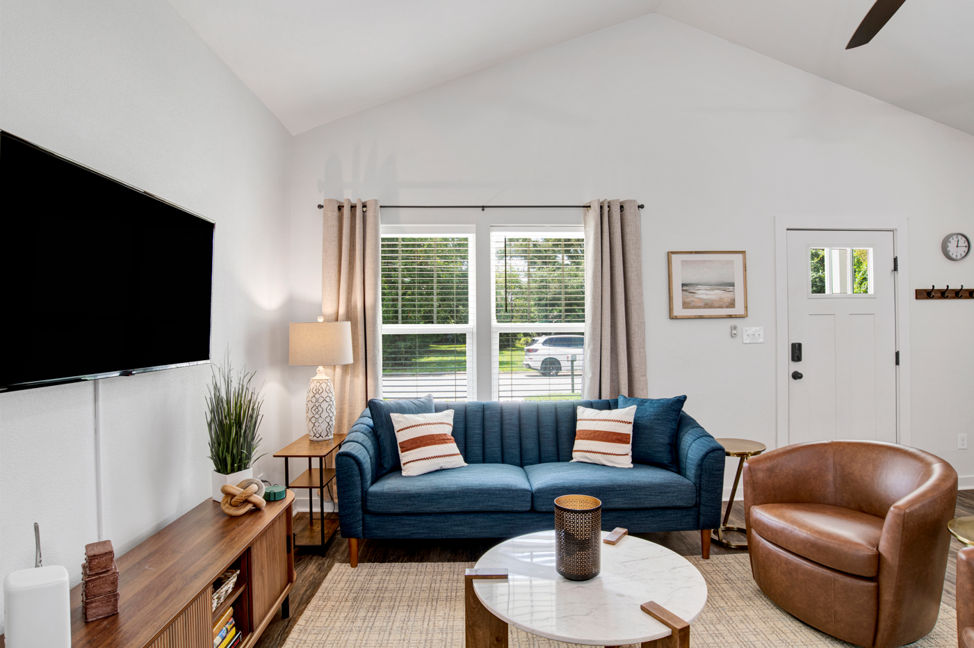 The open living area invites laughter, conversation and cozy evenings in.