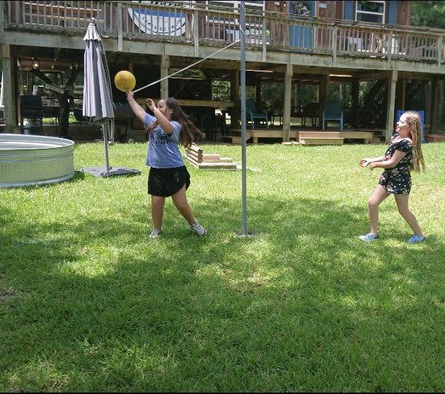 Having fun playing tether ball!