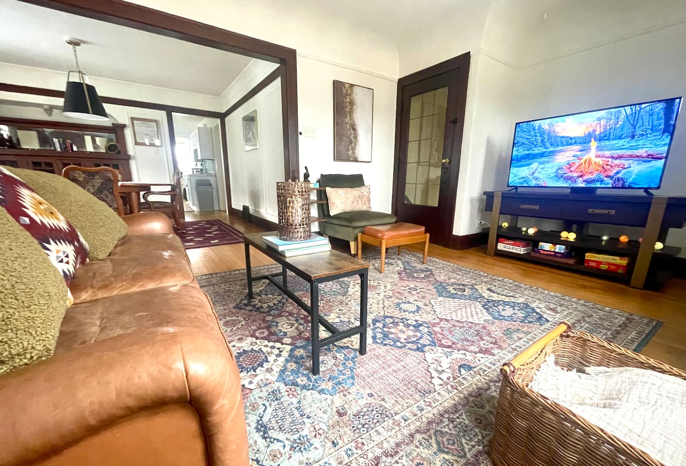 Curl up and unwind in this cozy living space—designed for slow mornings, relaxing evenings, and everything in between. Soft seating and warm wood tones create an inviting place to feel right at home.