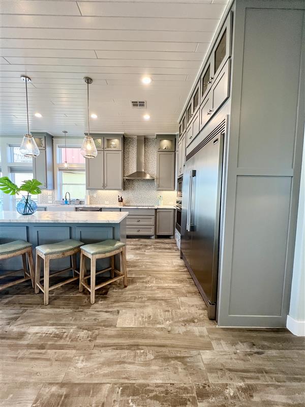 Crystal Paradise Kitchen: Bright, open kitchen featuring luxurious marble surfaces and generous space for gatherings.