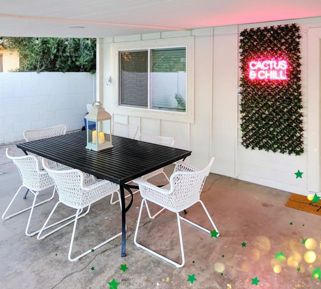 The spacious outdoor dining table under the covered patio is ideal for dining, games, or gathering with friends and family.