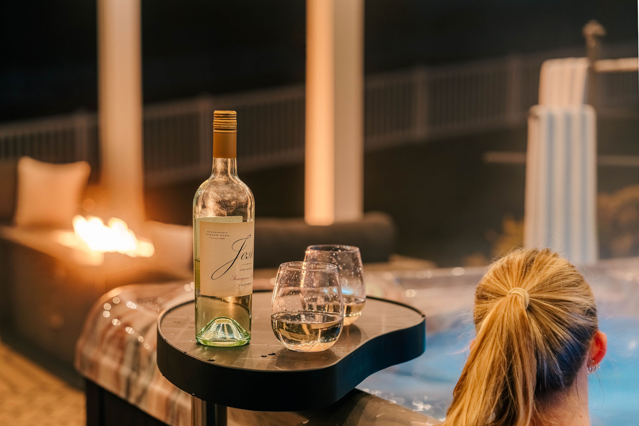 Private hot tub under the covered patio — unwind after games, hiking, or exploring Penn State.