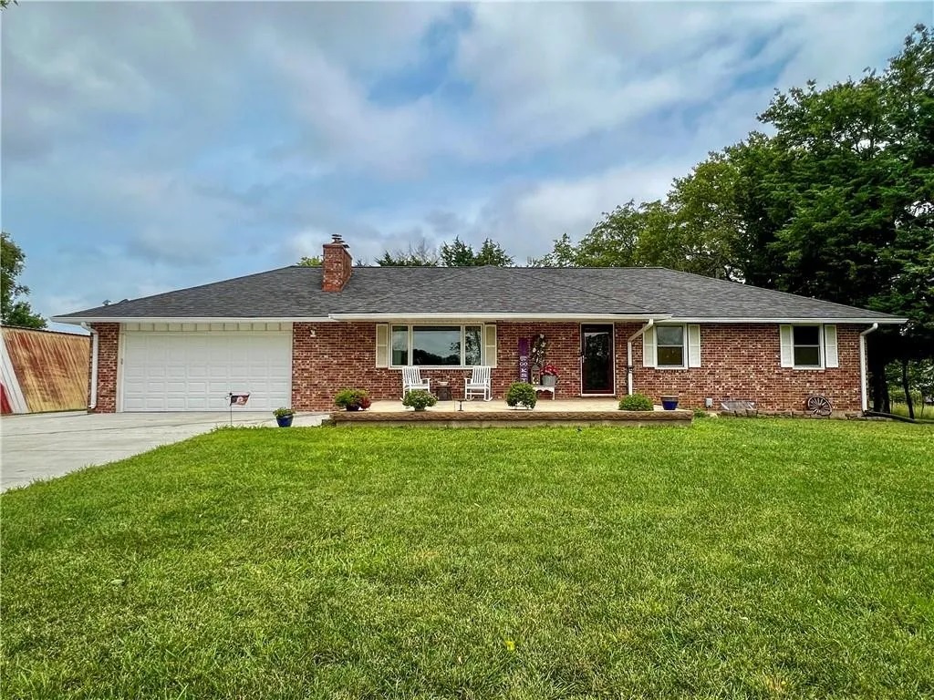 Surrounded by open land and greenery, this home offers a peaceful place to unwind and enjoy the quiet rhythm of farm life.