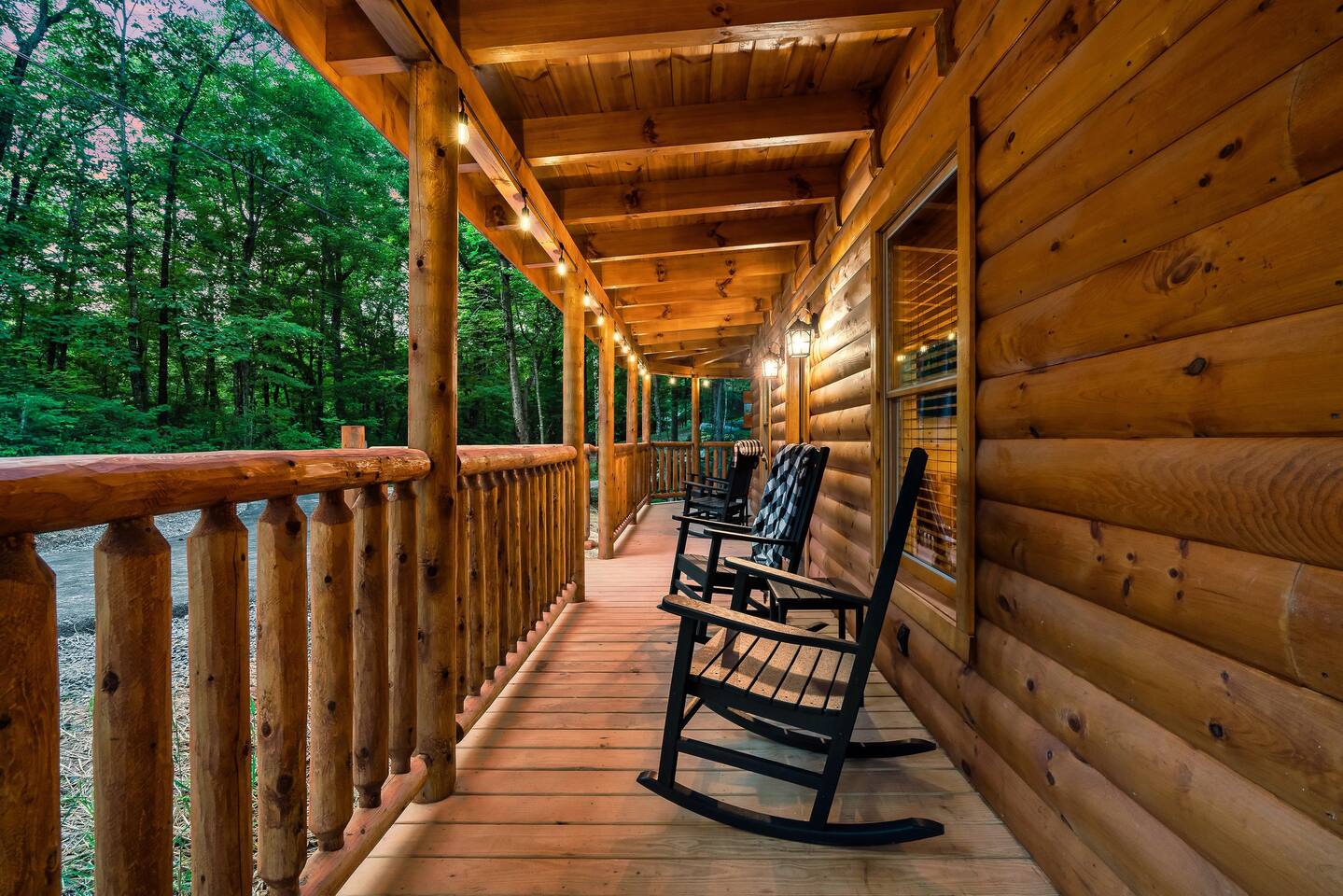 Wrap around porch with plenty of rockers to enjoy family time.