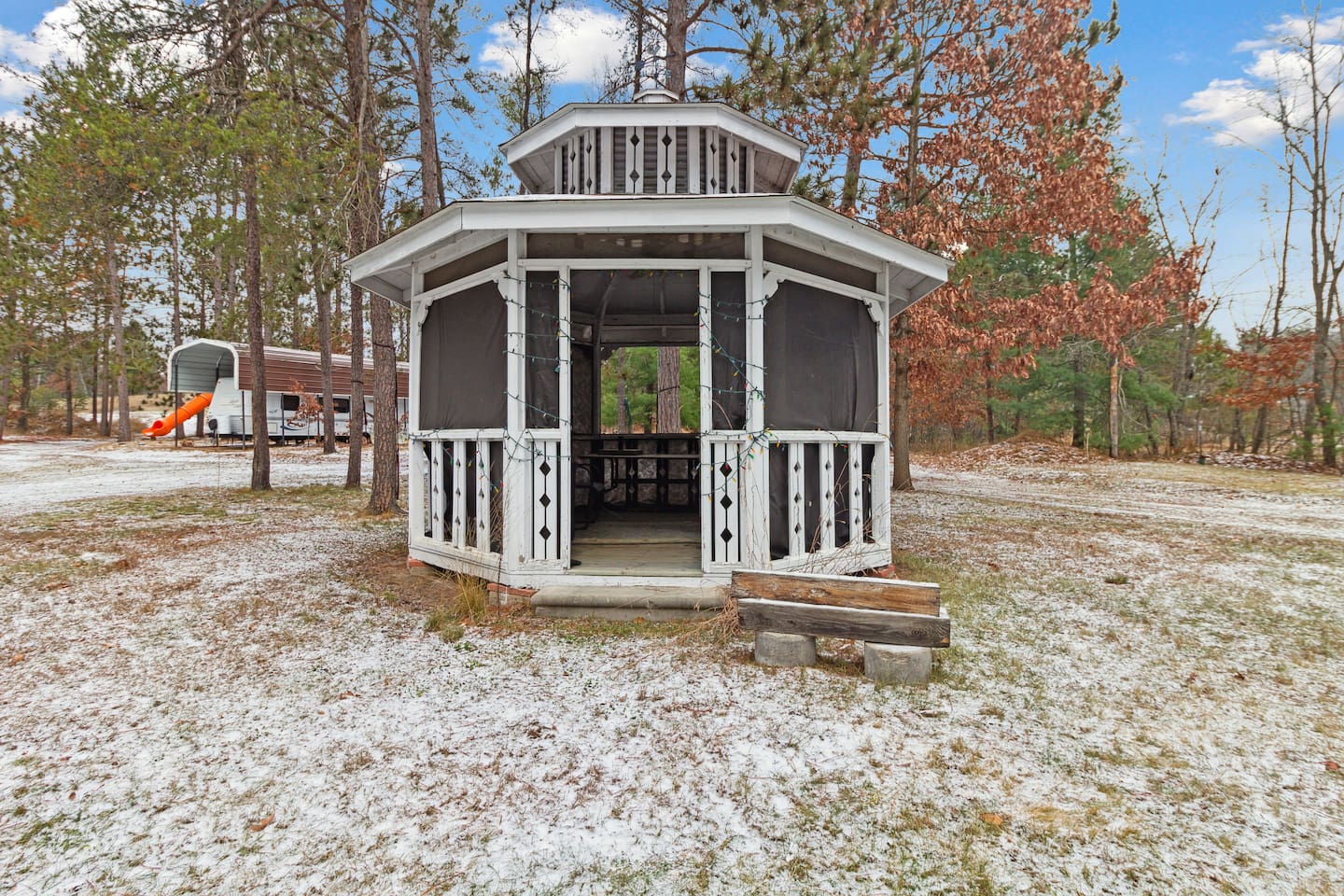 Our gazebo, complete with patio furniture and lights!