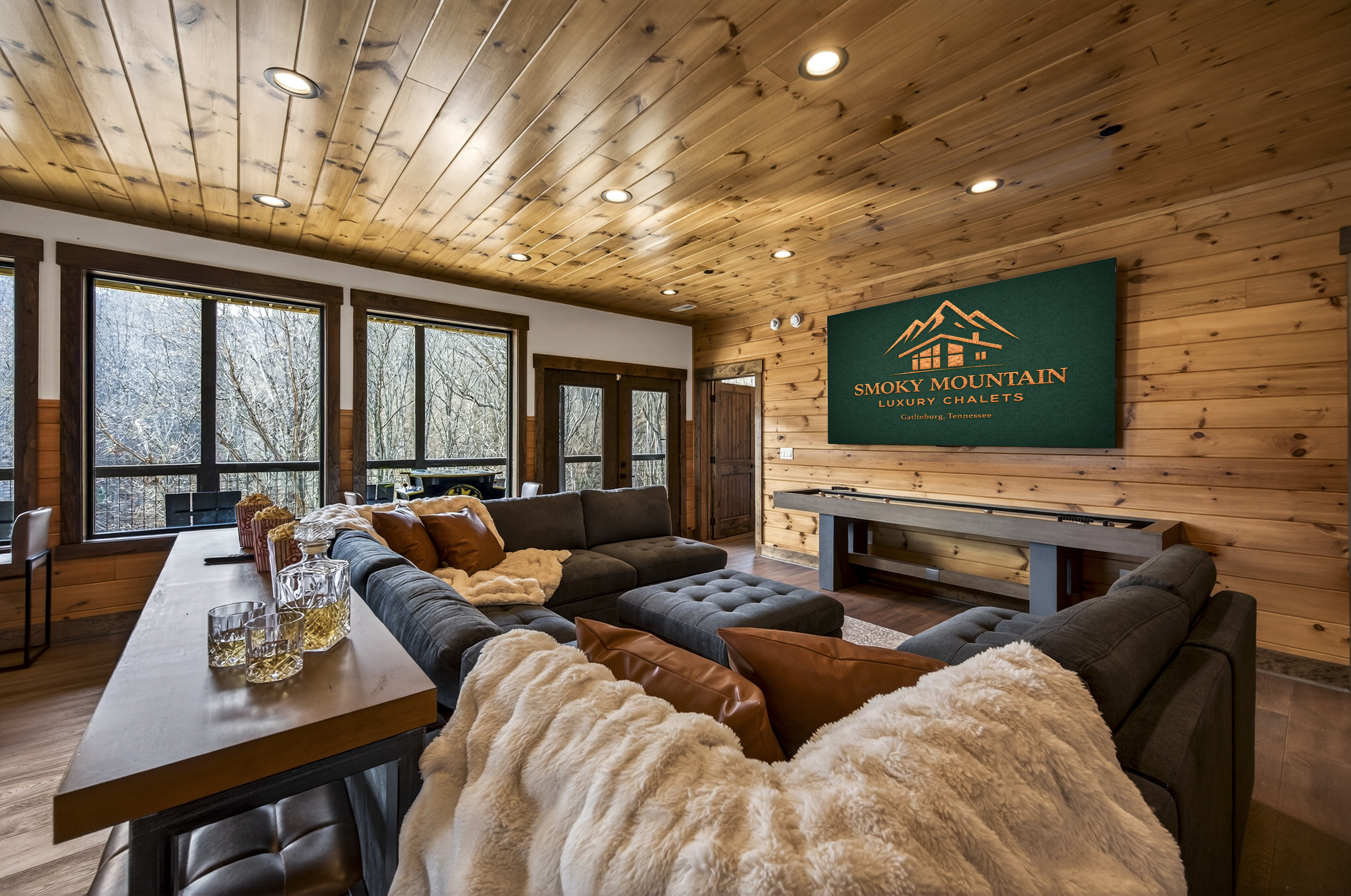 The perfect hangout after a day exploring the Smokies. Watch movies or the big game on the massive 100-inch TV, relax on the plush sectional, or grab a drink at the bar-top seating. Enjoy hours of fun with pool, shuffleboard, foosball, and classic arcade t