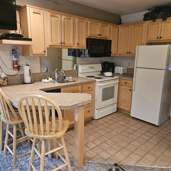 Breakfast nook next to kitchen.