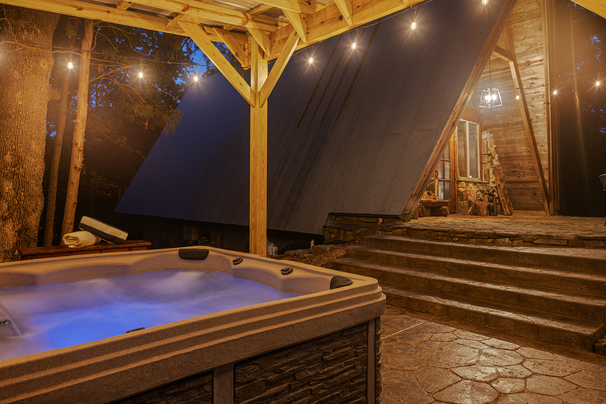 Find your bliss in the hot tub under its own shady pergola.
