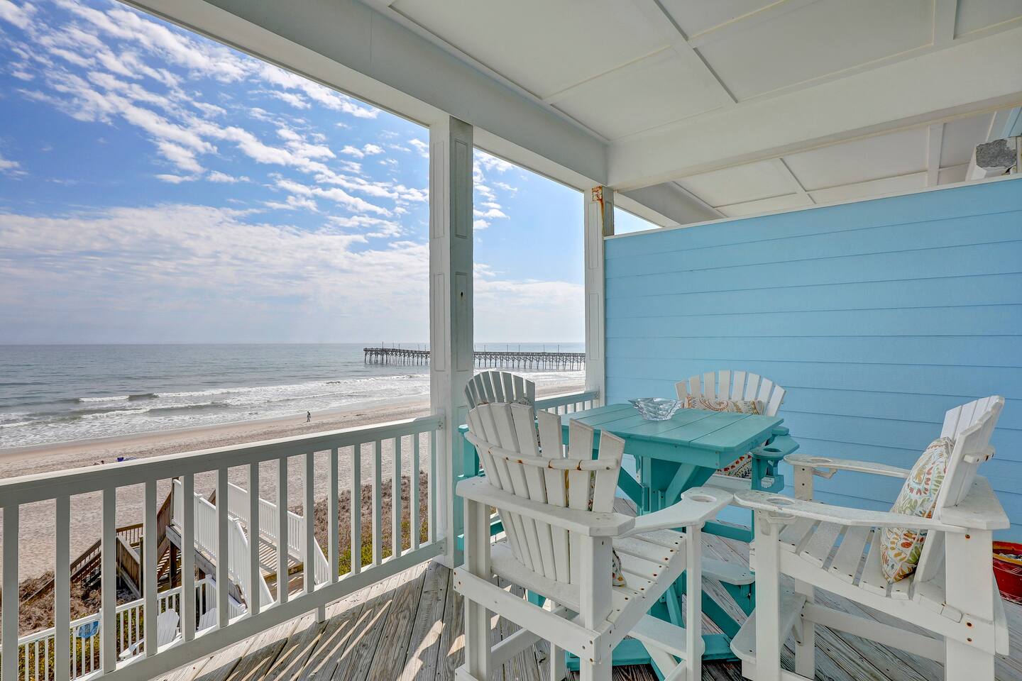 Top floor balcony located off of the living area with a wonderful view of the beach and pier!