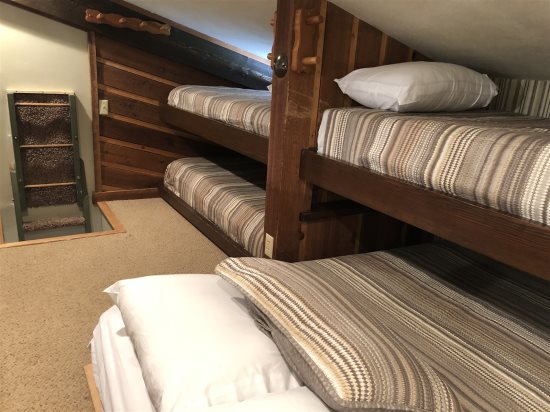 Loft area: 1 Full-size bed, 3 Twin beds.