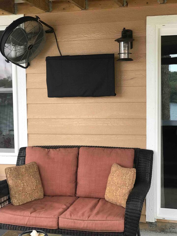 Outdoor TV allows you to watch Netflix, Hulu, Amazon Prime, as well as other internet television apps. Fan keeps air moving and the bugs away to enjoy the outdoor seating areas. 