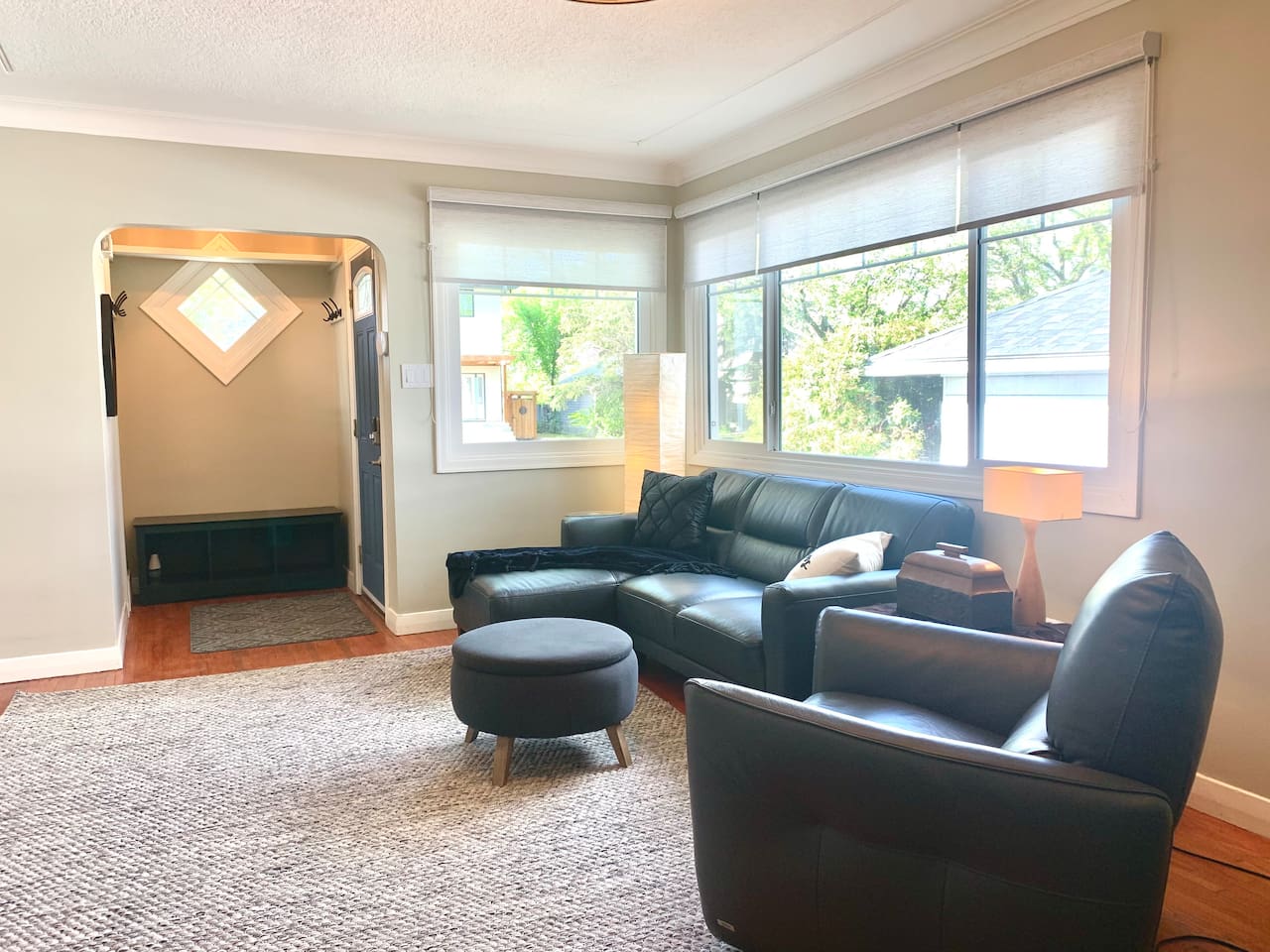 Lounge Area with Smart TV · Quality furnishings including an electric recliner.