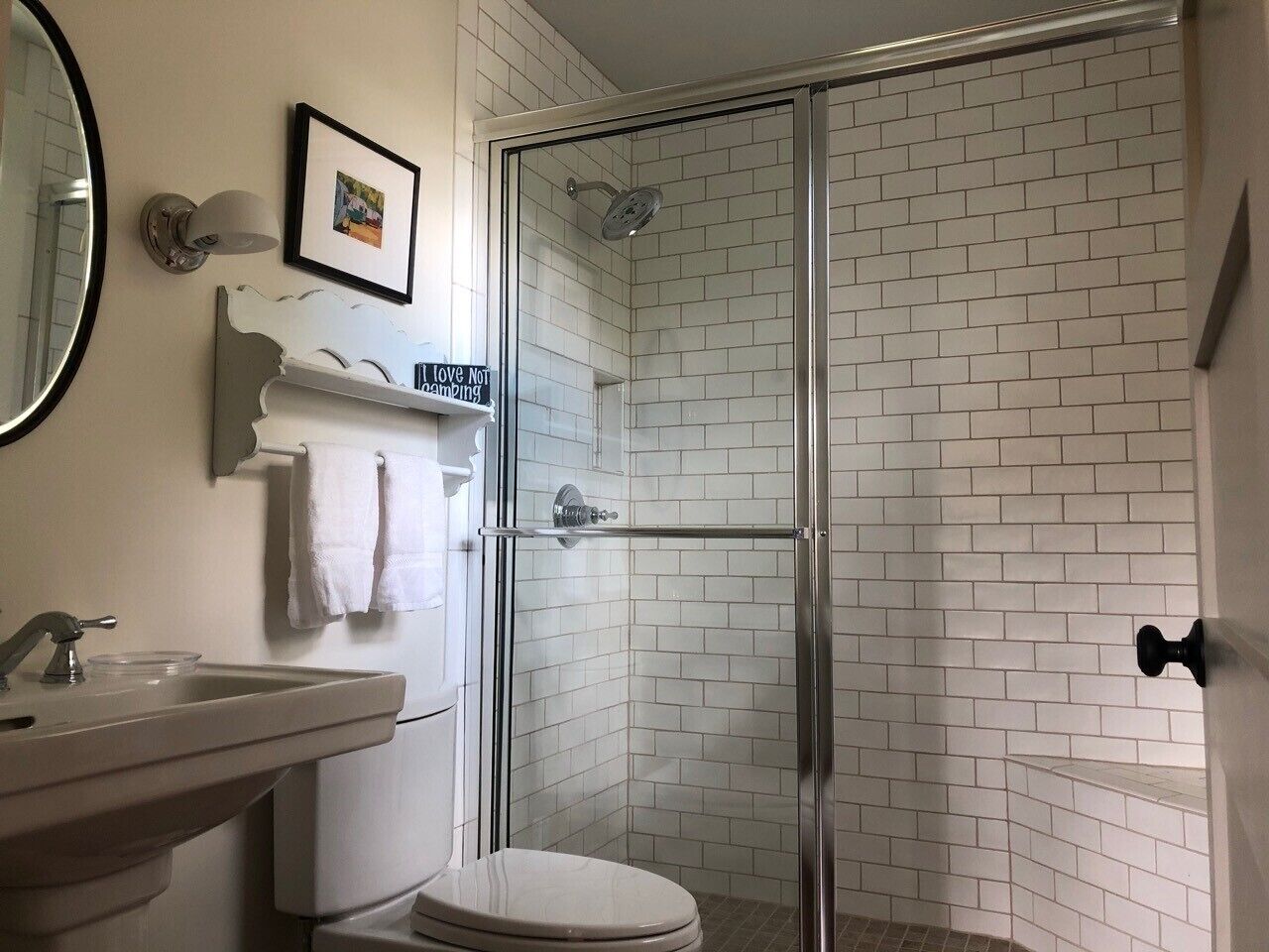 Bathroom located next to the loft bedroom. Shower has a rain shower head