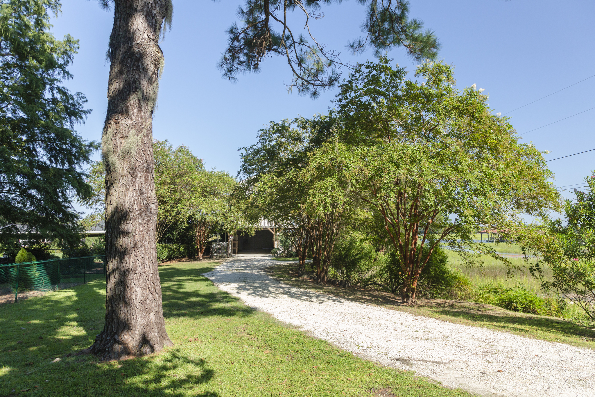 Peaceful gravel drive off the main road leads you straight to the cottage.