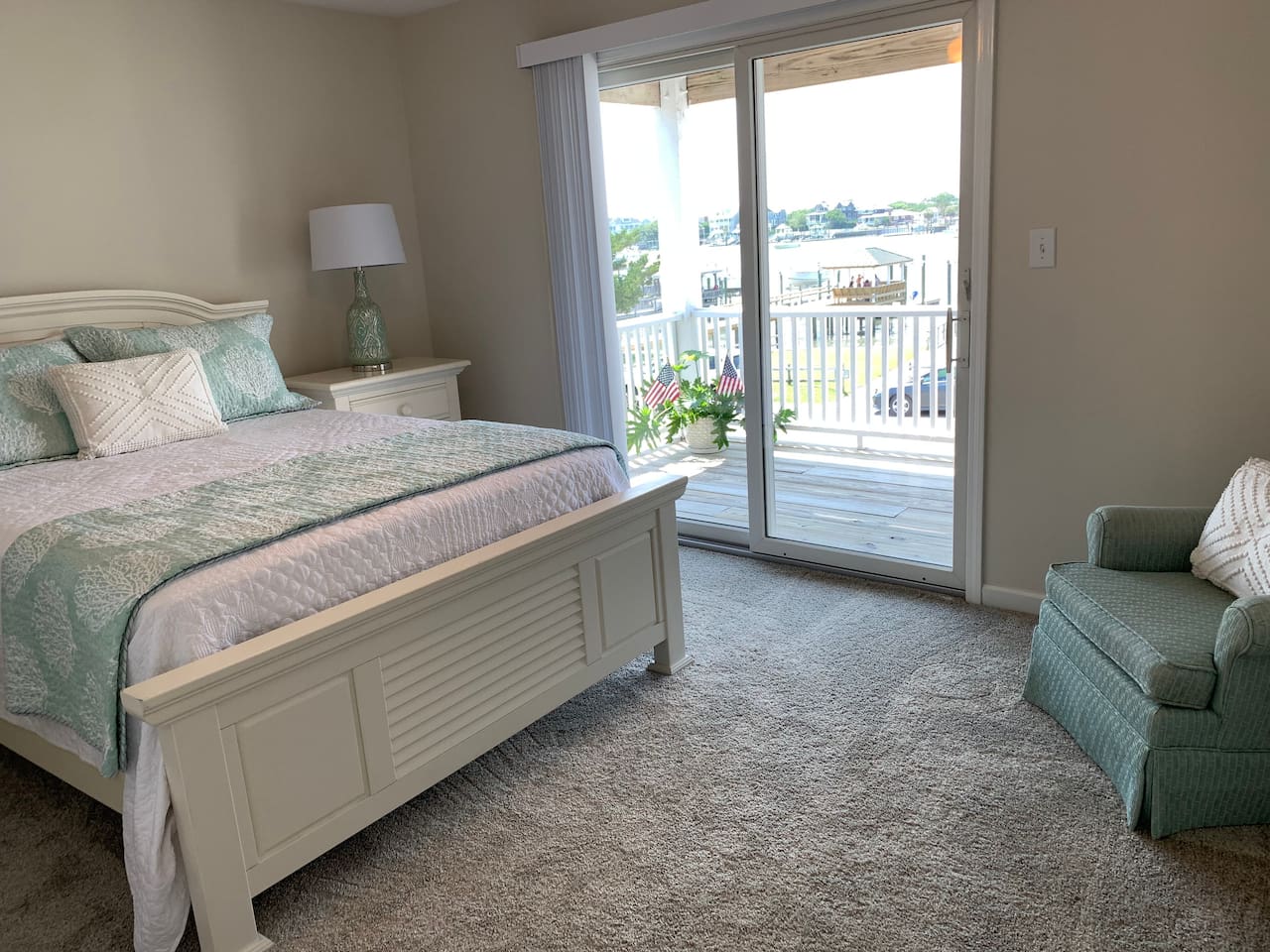 Master Bedroom with Waterfront Porch View and Access - Queen Bed