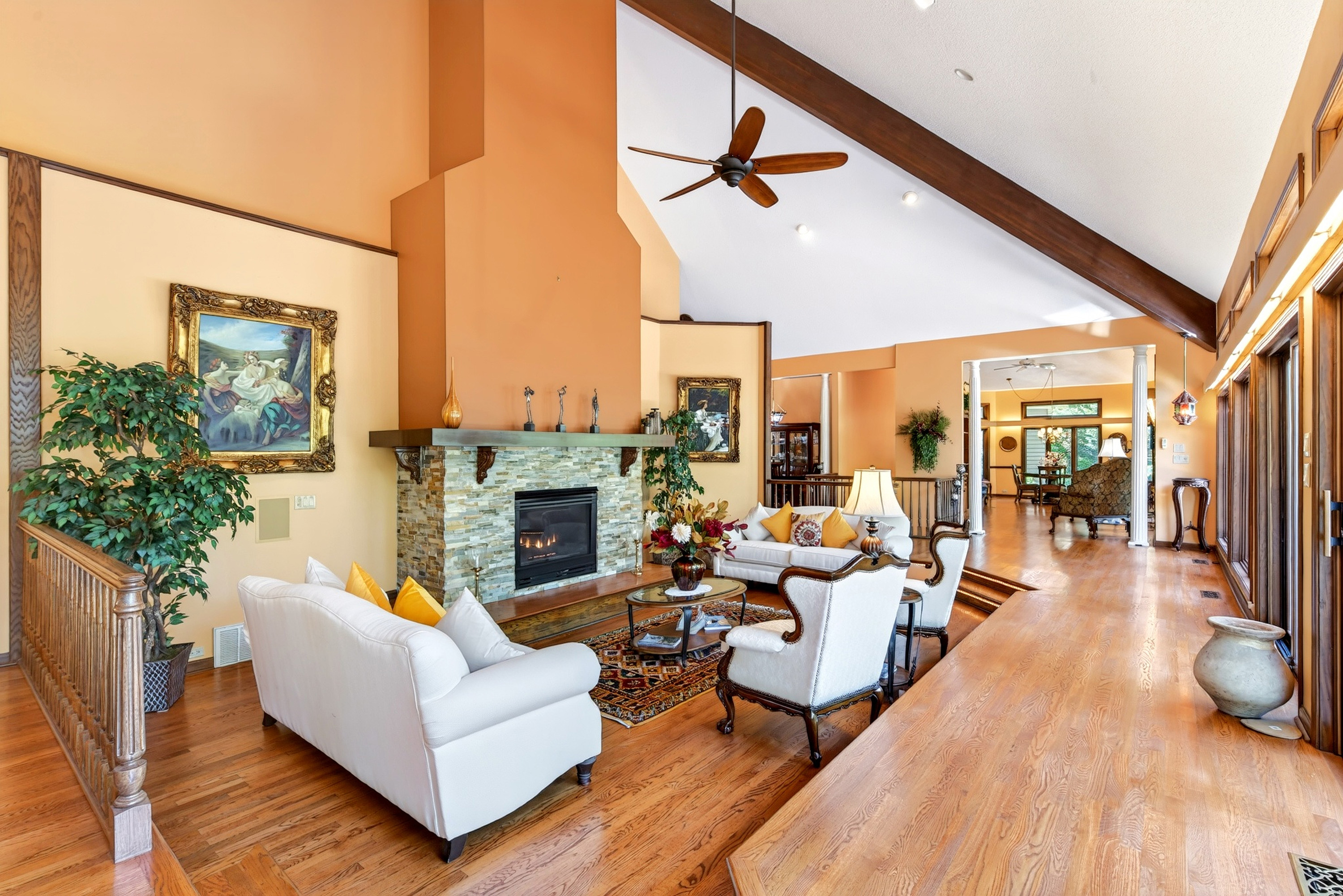 Main level living area with a large gas fireplace