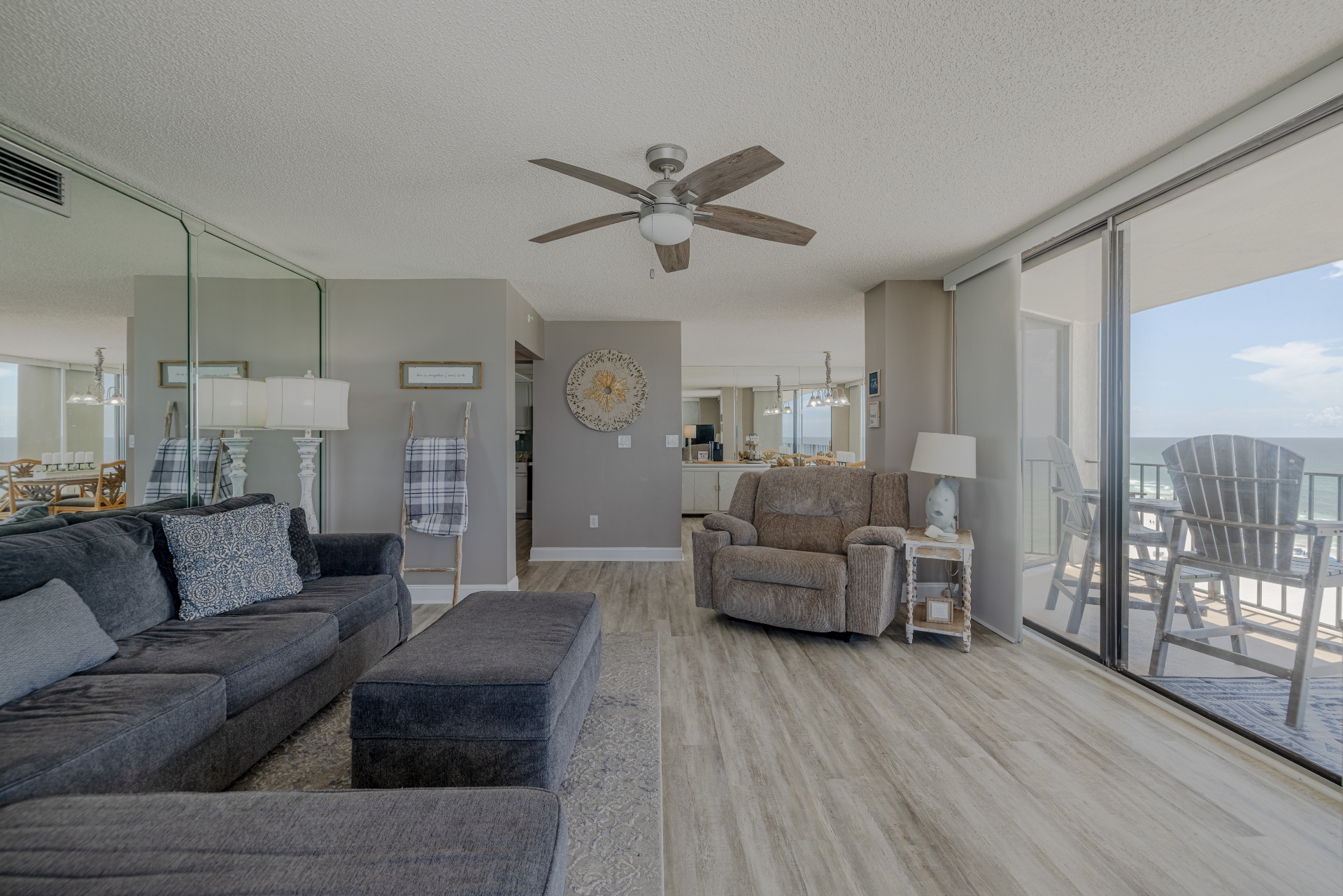 Living area with comfy couch and recliner chair