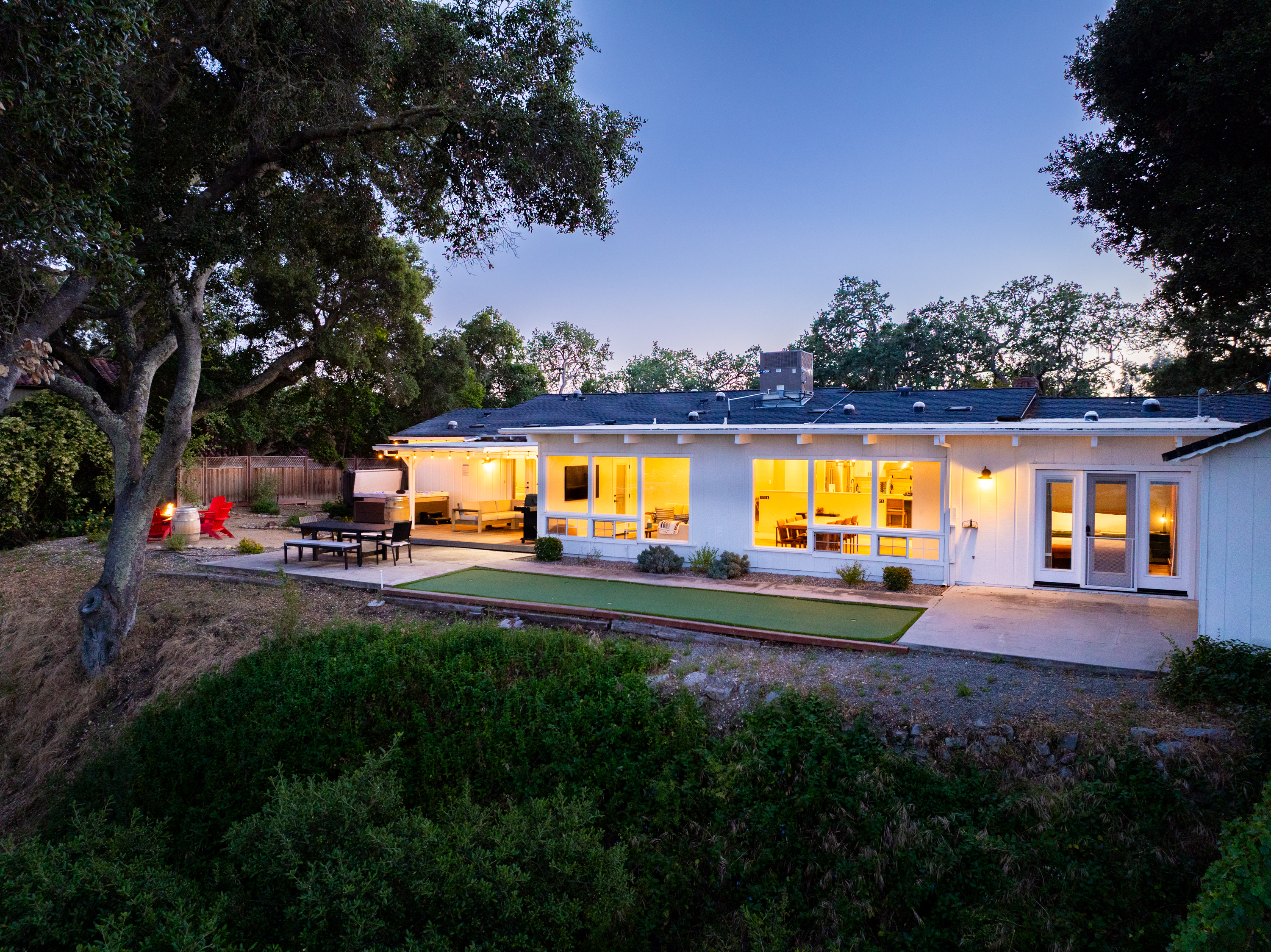 Perfect your putt or just enjoy the twilight in this spacious backyard.