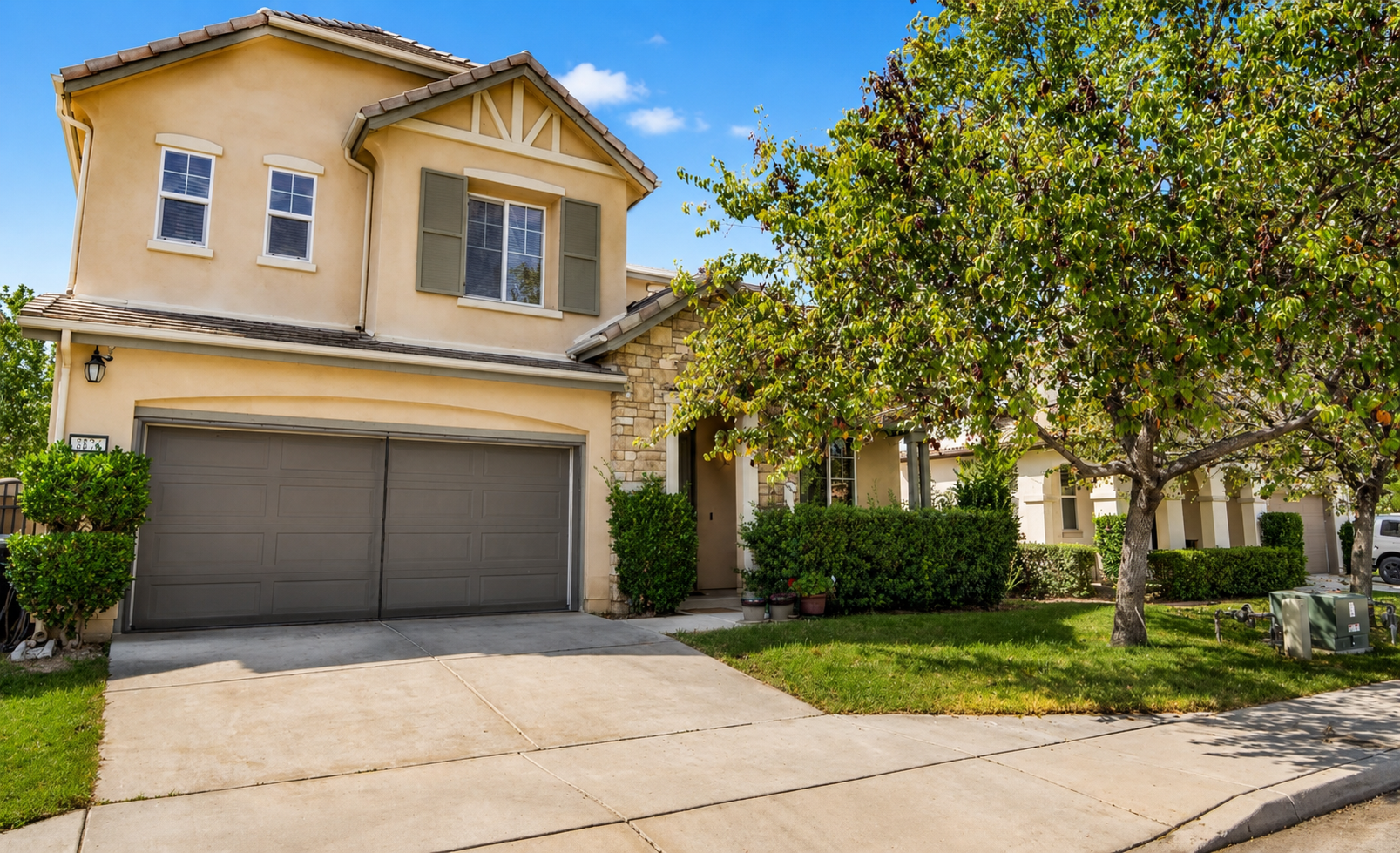 Front exterior with driveway parking. Please note that the property does not have garage access