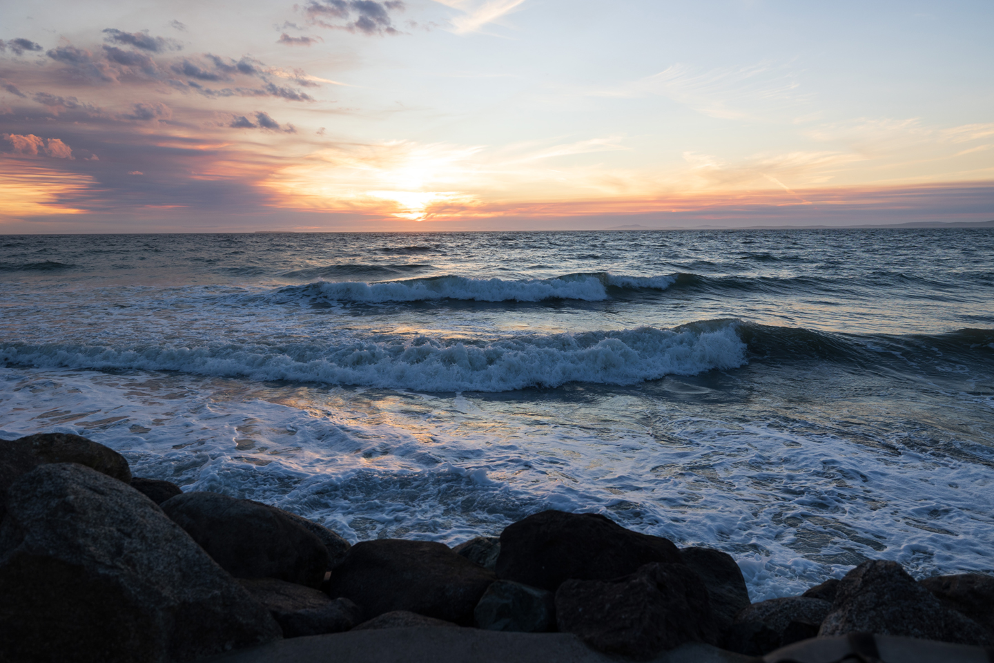 View of sunset and waves during high tides from the hot tub.