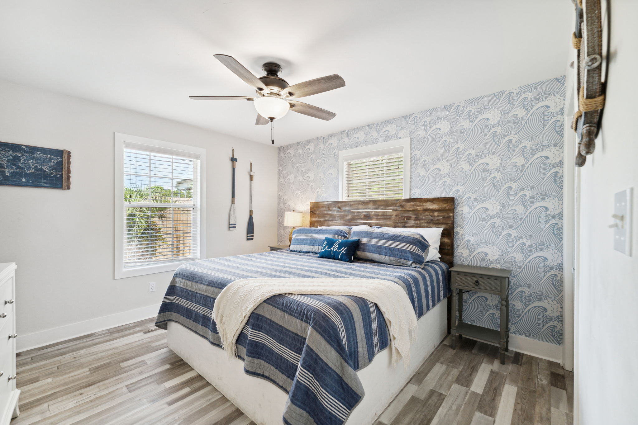 A king size bed is the perfect way to end any beach day! Happy dreaming in the cozy beach house master bedroom.