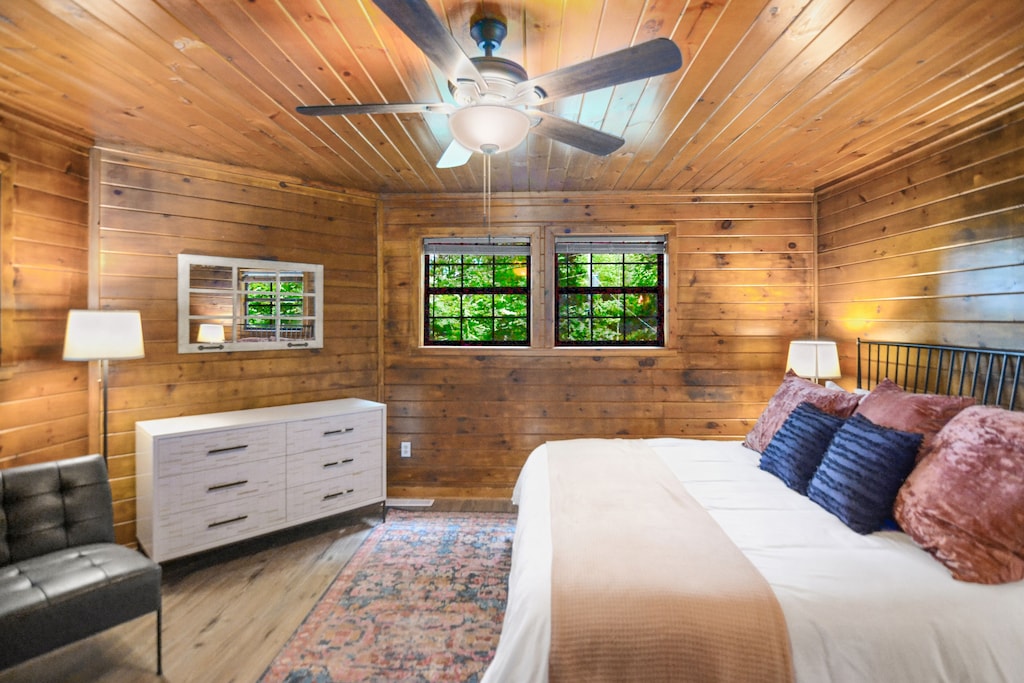 Upstairs bedroom w/ dresser and closet 