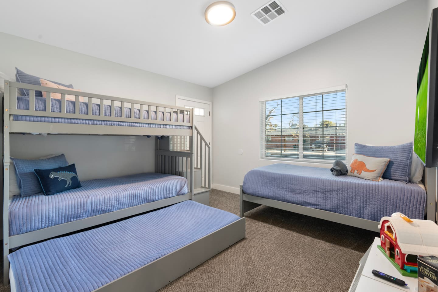 Compact bunk bed featuring two single beds, perfect for maximizing space while offering comfortable sleeping arrangements.