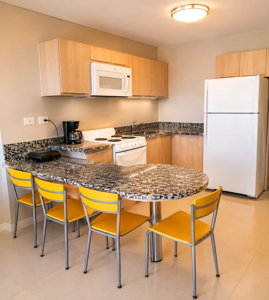 Enjoy your meals at a spacious dining area, perfect for gatherings or quiet dining.
