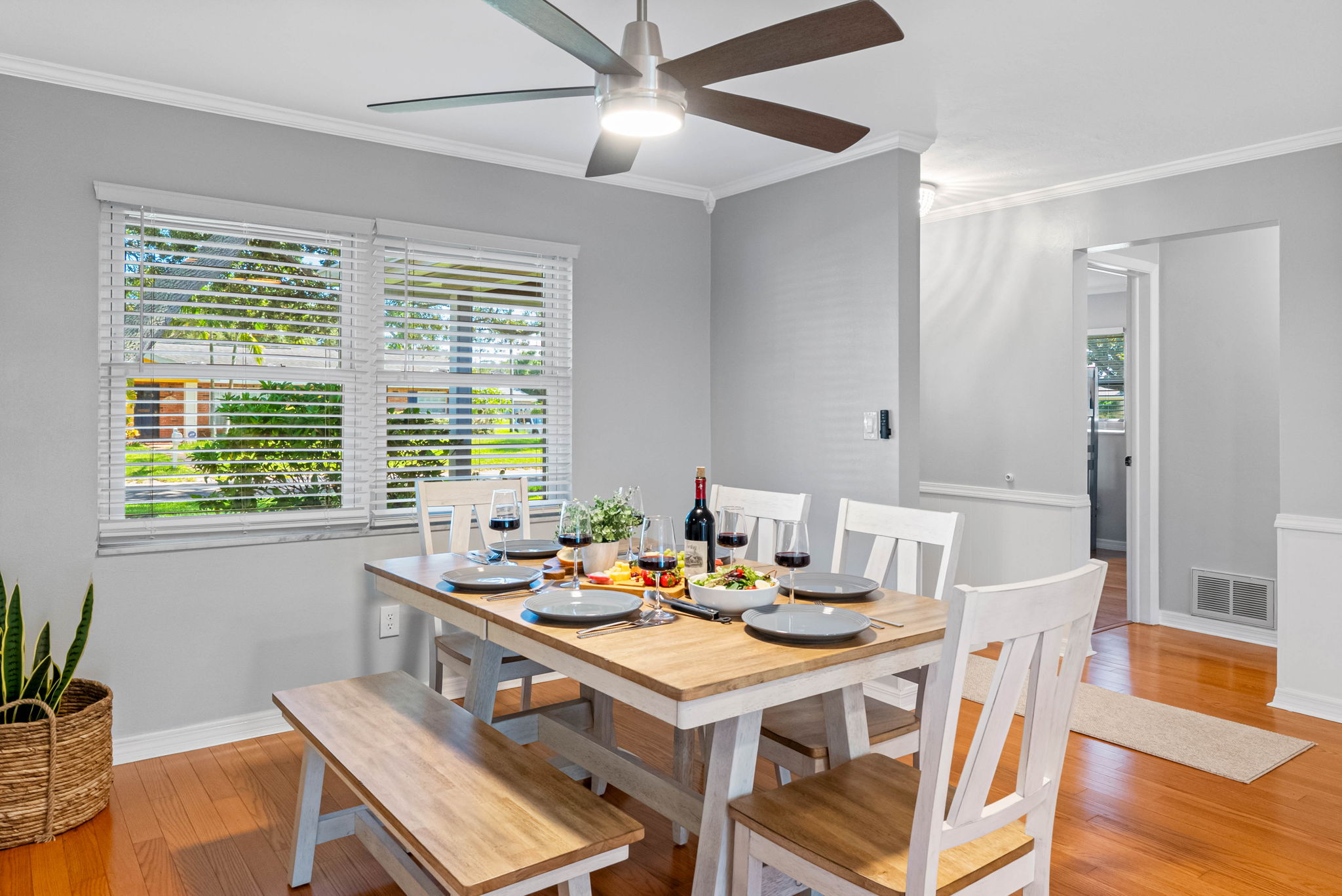 Open-concept charm—this dining space keeps everyone connected whether you're cooking, lounging, or eating.
