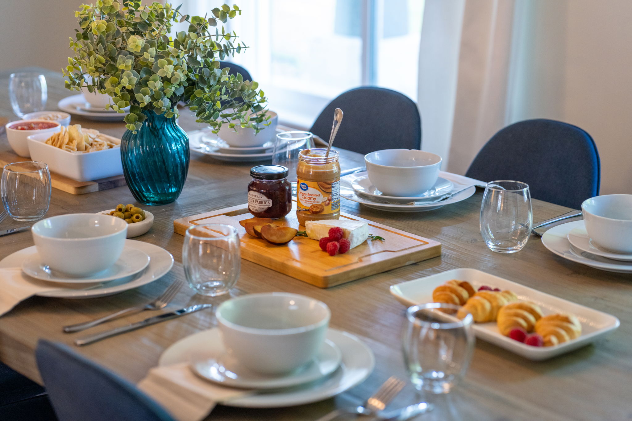 Designed for memorable meals, this dining room features a large table and comfortable seating for eight.