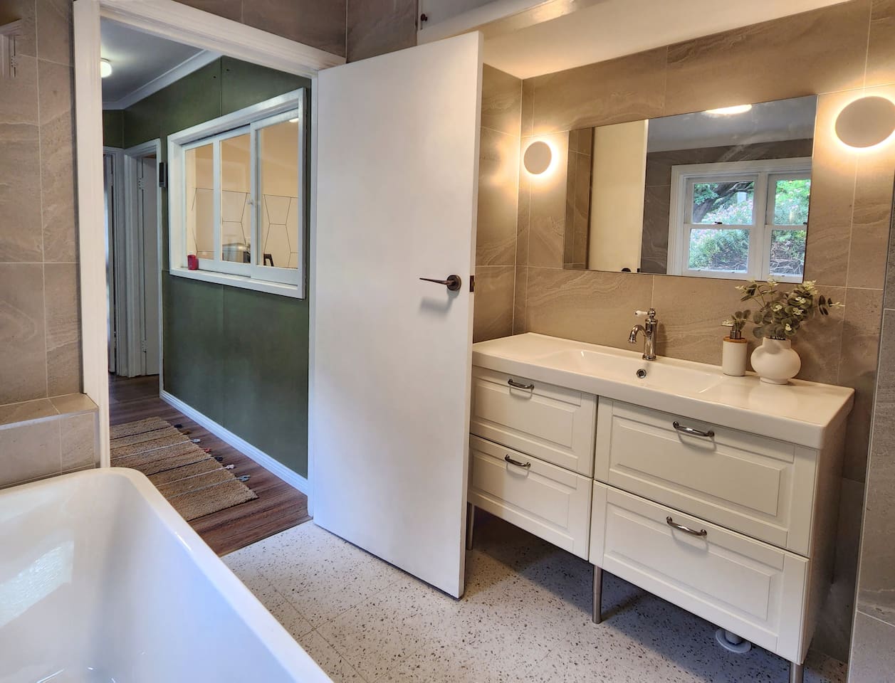 The vanities are stocked with hopefully everything you need. The all important TP, an Iron (Board in the room too), Hair dryer, washing powder and more. Ear cue tips are always topped up :)Turn on the vanity light for perfect ambience when bathing.