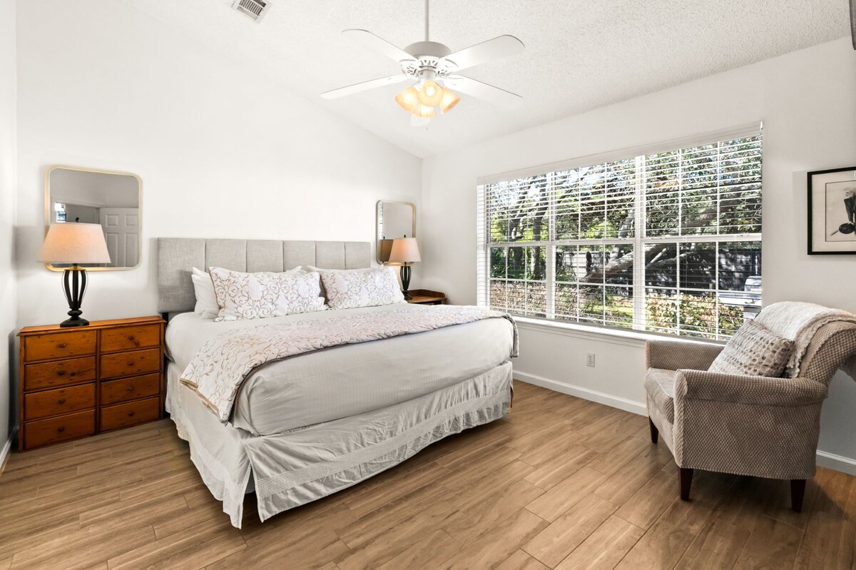 Master bedroom with a king bed