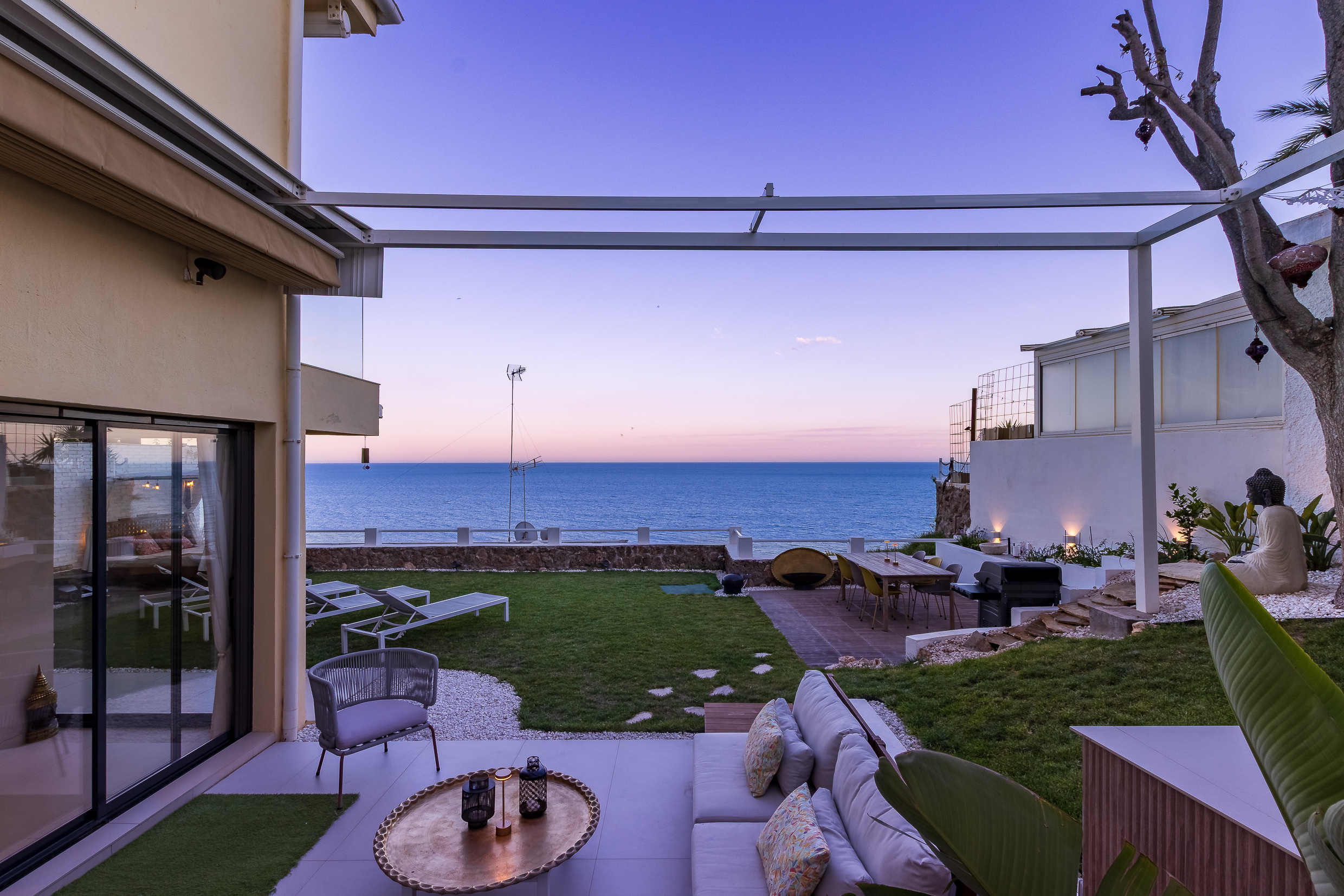Evening view across the garden towards the sea