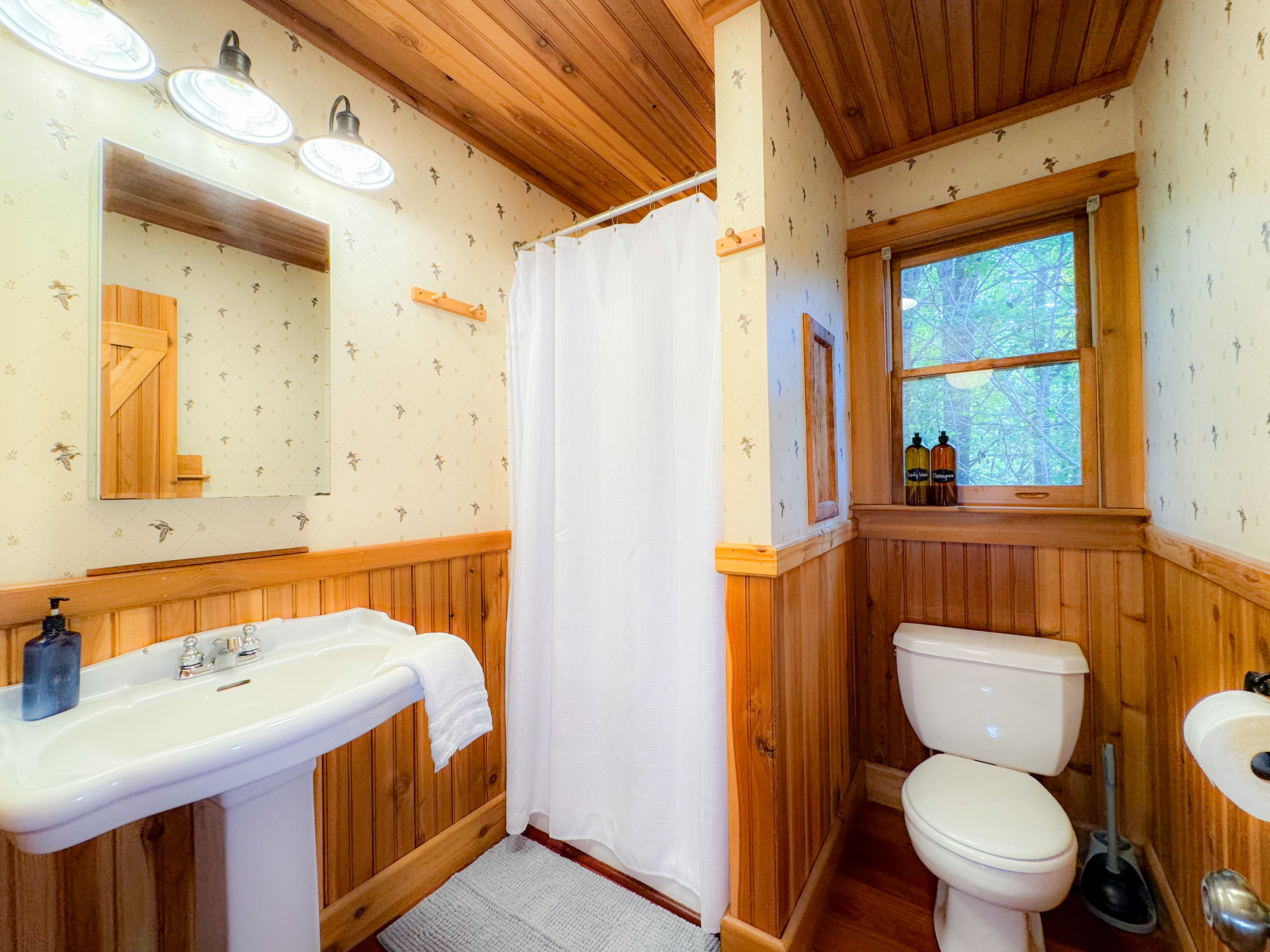 Full bathroom in the loft with a stall shower