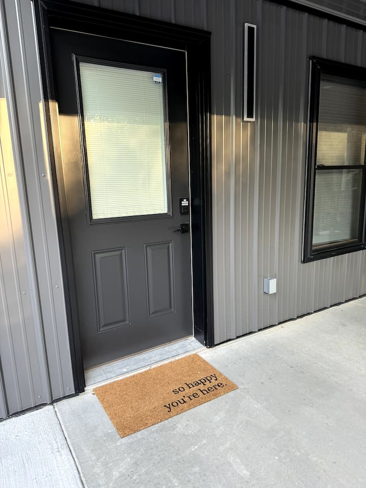 The front door has a keypad for self-check-in. The doorway is 36' wide for accessibility, and there are NO STEPS at this spacious shouse.