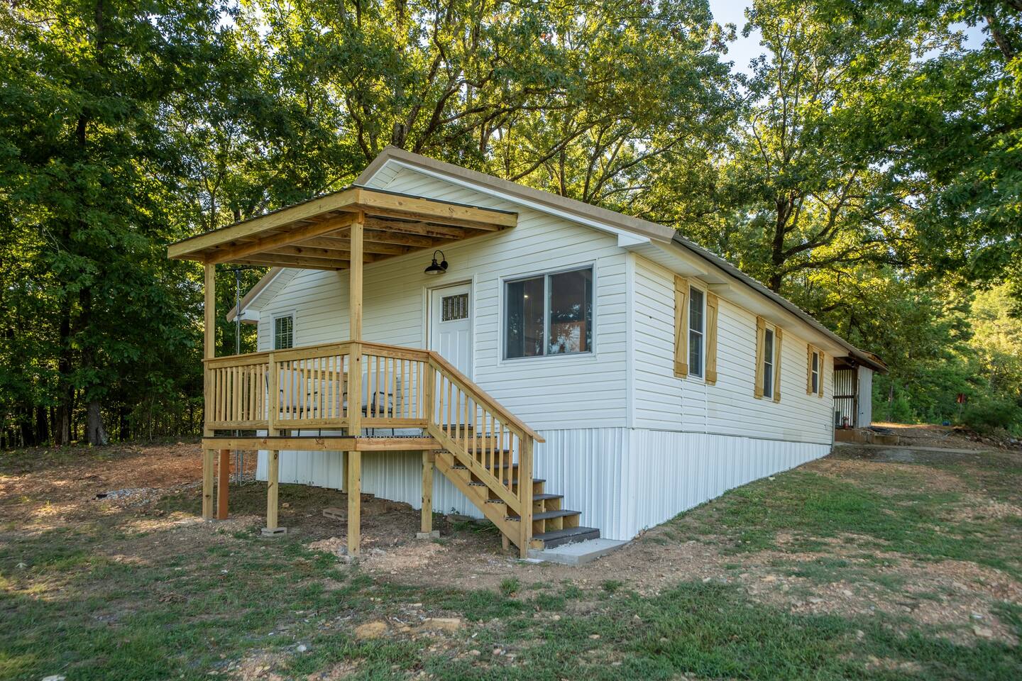 Farmhouse with porch.