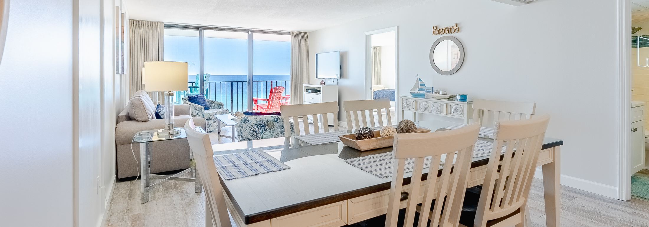 PCB Vacation Rental at Edgewater Beach Resort with beautiful ocean views and resort amenities. The living room of the 2-bedroom vacation condo overlooks the private resort beach in Panama City Beach, Florida at Edgewater Beach and Golf Resort.