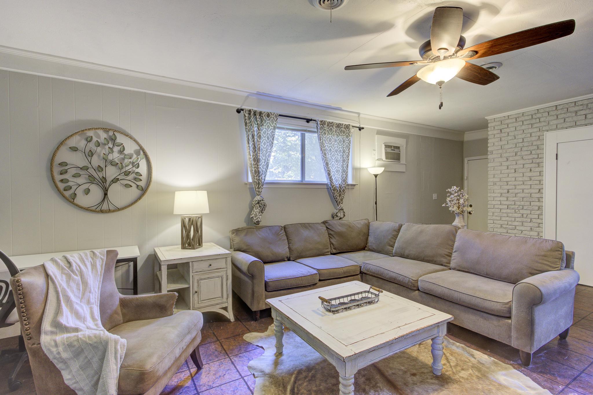 Spacious 2nd living room with desk, TV, and full size pull-out sofa bed
